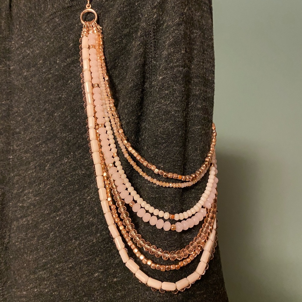 Pink and gold tone multi layer necklace